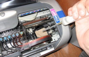 Как прочистить сопла в принтере?